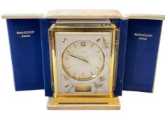Jaeger Le Coultre gilt brass White Bee Marina Atmos clock, plexi panels, 23cm high, 14cm depth,