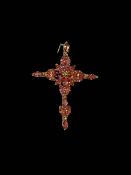 18 carat yellow gold cross set with pink sapphires