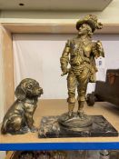 Gilt metal figure of cavalier on marble plinth and brass dog.