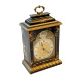 Elliott mantel clock with chinoiserie decorated case, 28cm to top of handle.