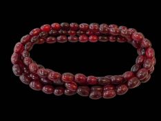 Cherry amber necklace, 180cm length, 153 grams.
