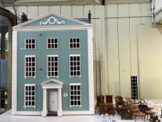 Large three storey Georgian Town House style dolls house with a selection of furniture.