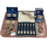 Silver napkin rings including two pairs, six Art Deco teaspoons, two spice holders and EP flatware.