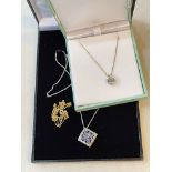 9 carat white gold gem set pendant and chain,