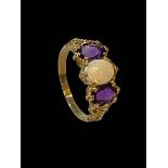 Opal and amethyst three stone 9 carat gold ring, size Q.