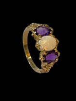 Opal and amethyst three stone 9 carat gold ring, size Q.