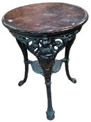 Circular cast base Britannia pub table, 73cm by 59cm diameter.