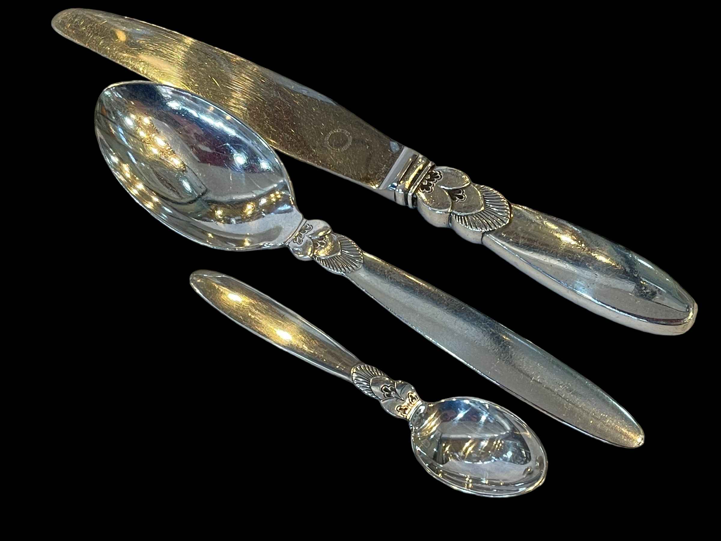 Georg Jensen silver handled knife and two spoons (3).