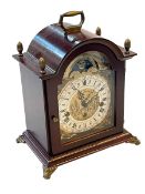 Mahogany mantel clock with brass mounts and Franz Hermle, West Germany striking movement,