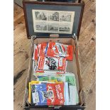 Collection of Speedway programmes and print of historic building.