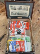 Collection of Speedway programmes and print of historic building.