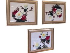 Three framed Chinese floral studies.