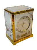 Jaeger Le Coultre gilt brass chinoiserie Atmos clock, plexi panels, 23cm high, 14cm depth.
