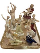 Collection of Austrian lady dancing figures, boy and girl with flowers, and children group (9).