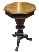 Victorian octagonal walnut sewing table on triform base, 76cm by 45cm by 43.5cm.