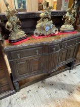 1920's carved oak two door sideboard with raised back, 129cm by 137cm by 56cm.