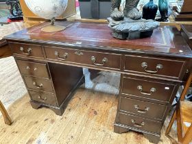 Mahogany eight drawer pedestal desk, 76cm by 122cm by 61cm.