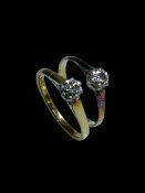 Two solitaire diamond 18 carat gold rings, size M & O.