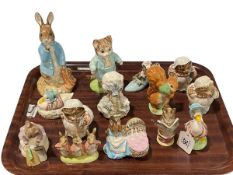 Collection of fourteen Beswick and Royal Albert Beatrix Potter figures.