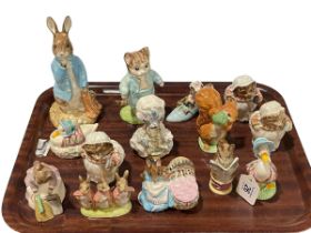 Collection of fourteen Beswick and Royal Albert Beatrix Potter figures.