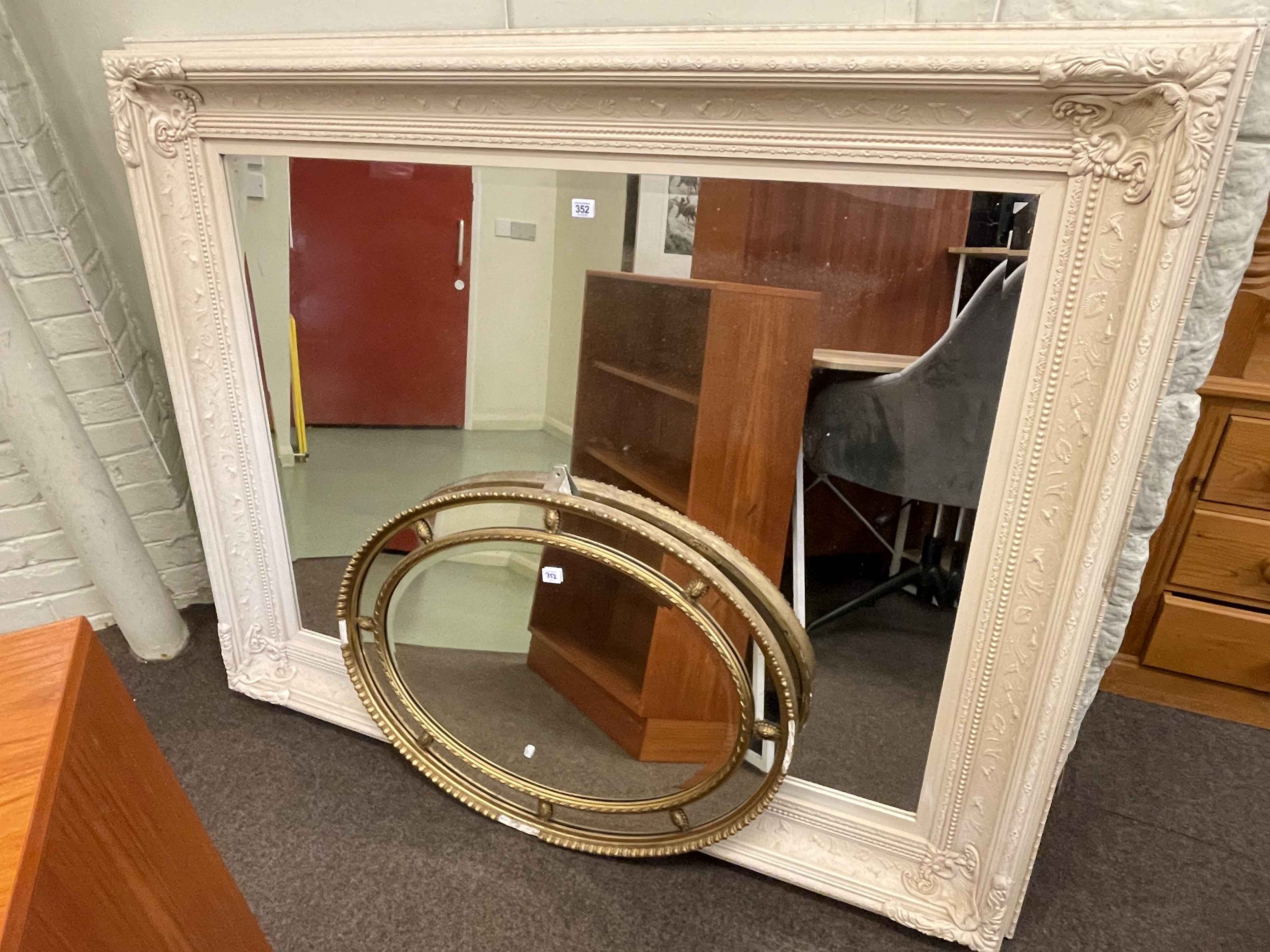 Large ivory painted frame bevelled overmantel mirror, 122cm by 152cm,