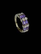 Amethyst and diamond 9 carat gold ring, size O.