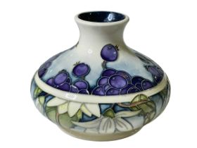 Moorcroft squat vase 'Juneberry'.