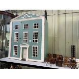 Large three storey Georgian Town House style dolls house with a selection of furniture.
