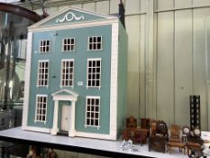 Large three storey Georgian Town House style dolls house with a selection of furniture.