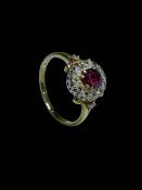 Ruby and diamond cluster 18 carat gold ring, size O/P.