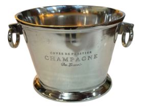 Silver plate style two handled champagne bucket.