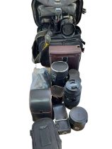 Collection of cameras and lenses including Tamron, Mamiya, Nikon D5100, etc.