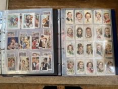 Two albums of cigarette, confectionary cards inc Mars, Barratt & Co Ltd, Ardath, Carreras Ltd,