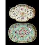 Two Chinese oval dishes each with floral decoration, iron red impressed marks to base.