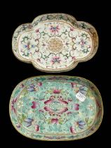 Two Chinese oval dishes each with floral decoration, iron red impressed marks to base.