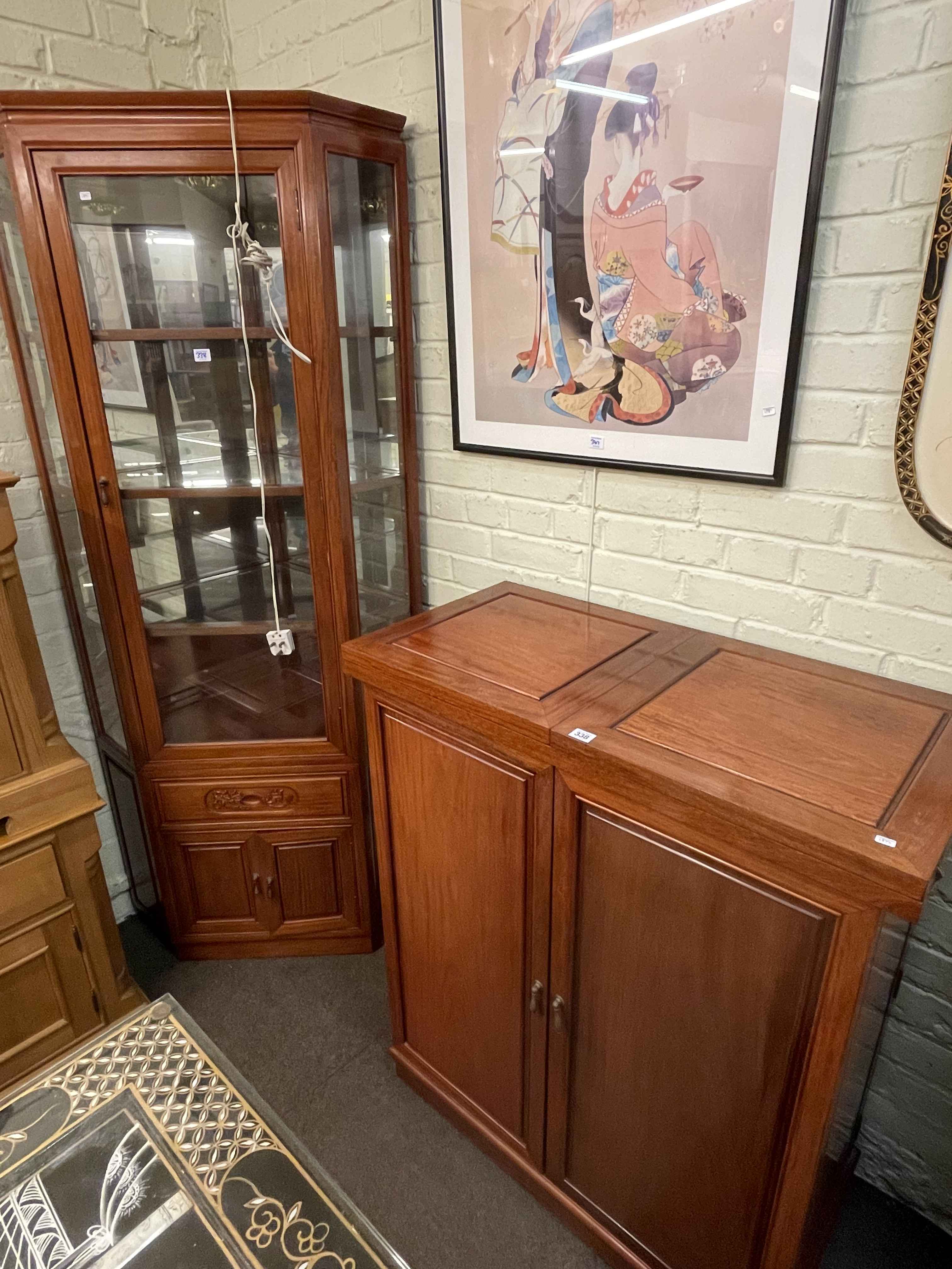 Three piece suite of Oriental style furniture comprising two door cocktail cabinet,
