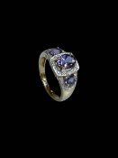 9 carat amethyst and diamond cluster ring, size O.