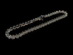 18 carat white gold and diamond tennis bracelet with a total diamond contents of 2.50 carats.