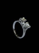 Diamond three stone 18 carat white gold ring, size P.