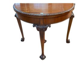 Mahogany Chippendale style demi lune fold top card table, 75cm by 91cm by 45cm (closed).