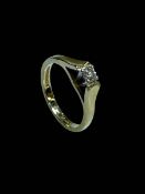 18 carat yellow gold and 0.20 carat diamond solitaire ring, size N.