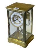 French brass mantel clock with Mercury pendulum.