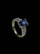 9 carat gold, tanzanite and diamond ring, size M.