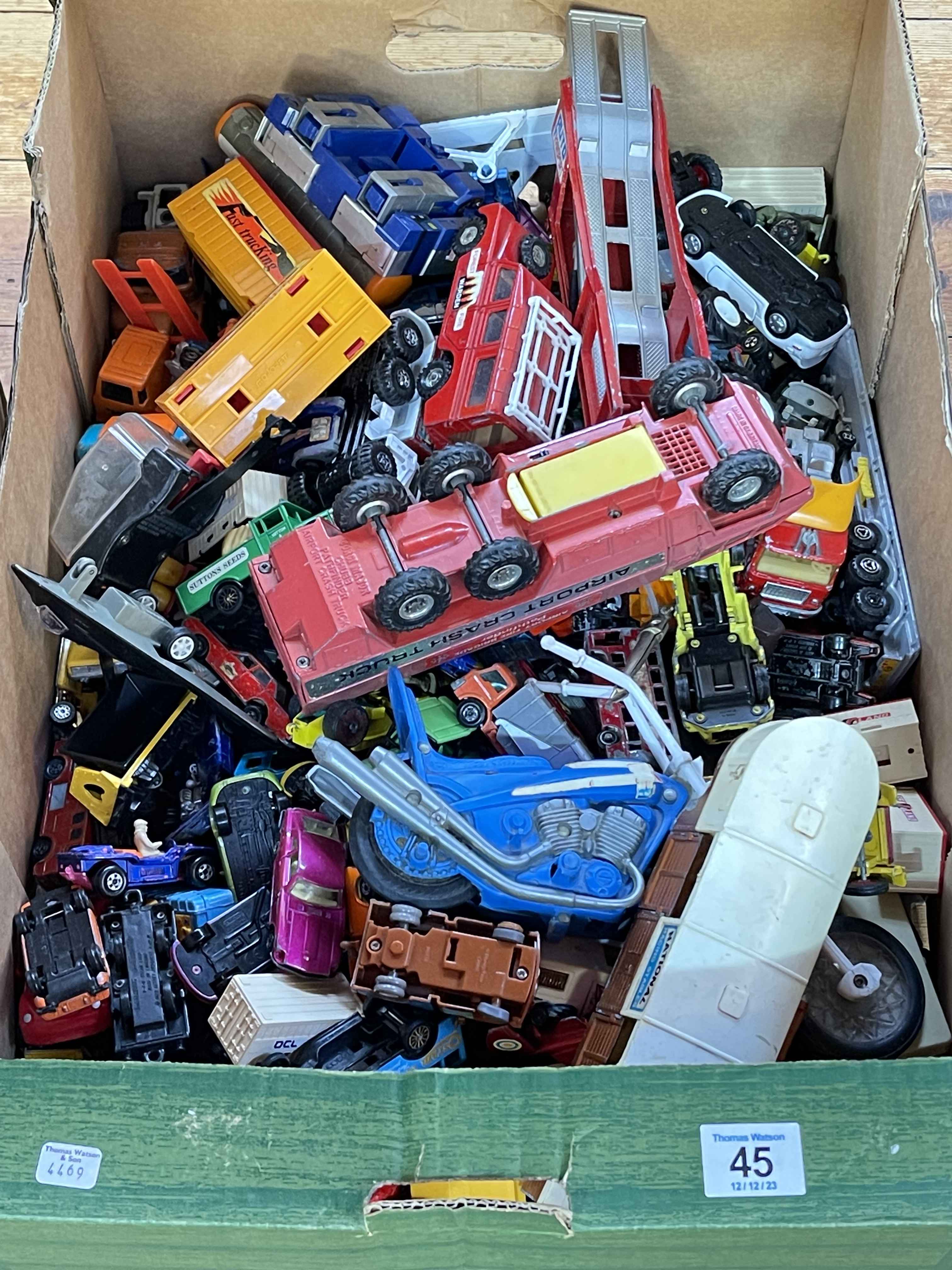 Box of model vehicles.