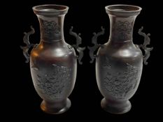 Pair Oriental bronze two handle vases, 29.5cm.