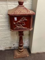 Cast pedestal post box and keys, 114cm by 42cm by 30cm.