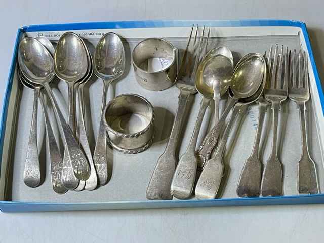 Set of six George III silver dessert spoons, other flatware and two napkin rings.