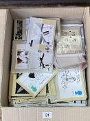 Box of stamps and first day covers.