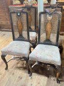 Set of four inlaid and Bergere panel back dining chairs.