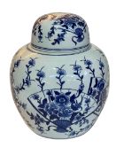 Large Chinese ginger jar with blue and white floral decoration.